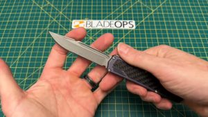 holding the blade of the Guardian Tactical Scout knife