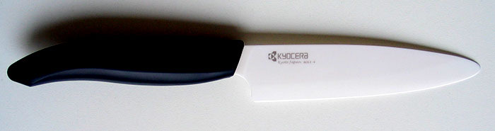 A Kyocera ceramic knife with a white blade.
