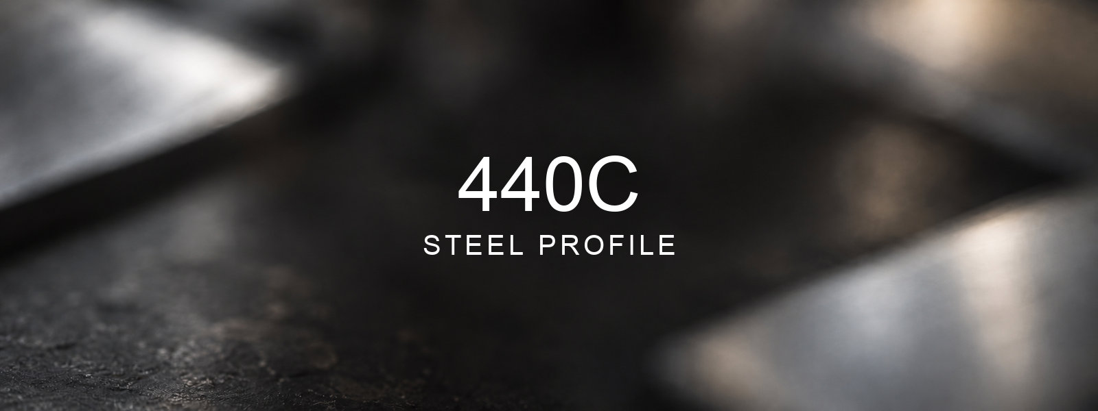 440C Steel Profile over a blurred abstract steel background