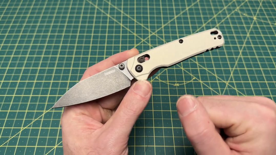 Kershaw Bel Air 6105 with its blade open, showing the bright nickel aluminum handle and DuraLock control.