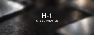 H-1 Steel Profile over a blurred abstract steel background