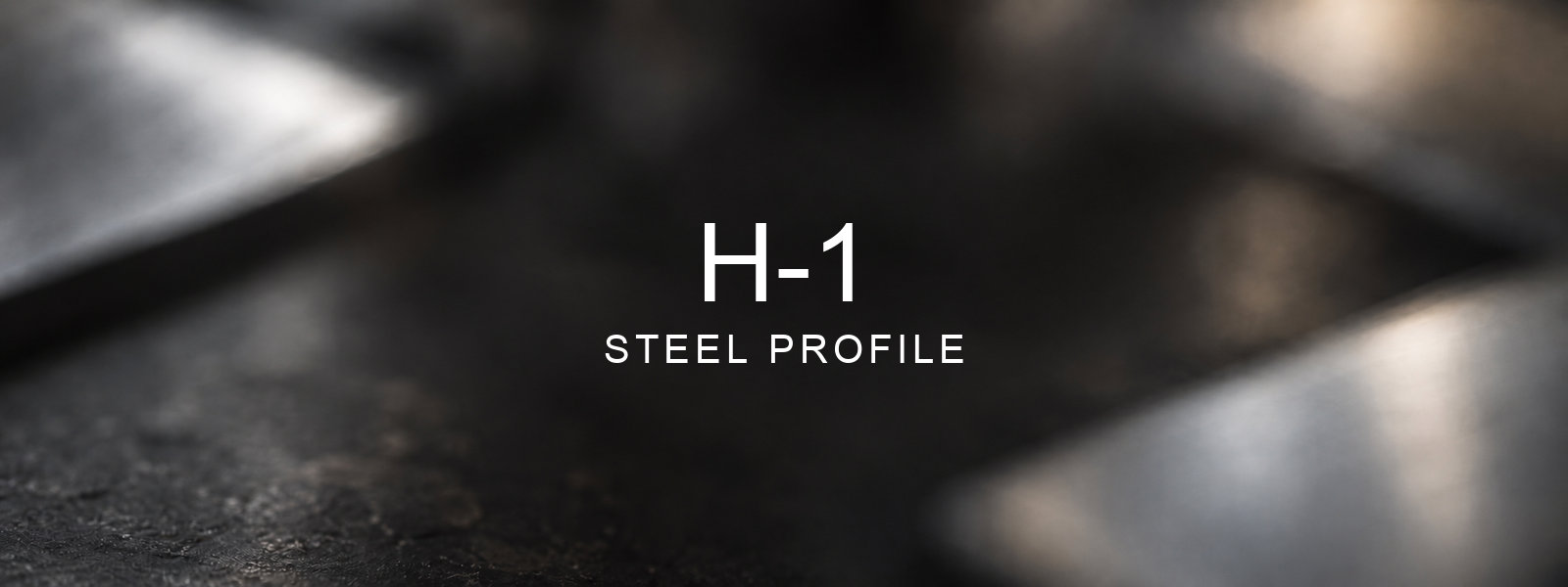 H-1 Steel Profile over a blurred abstract steel background