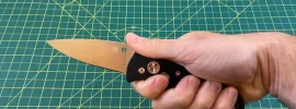 Spyderco Autonomy 2 folding knife held in one hand, full blade and handle