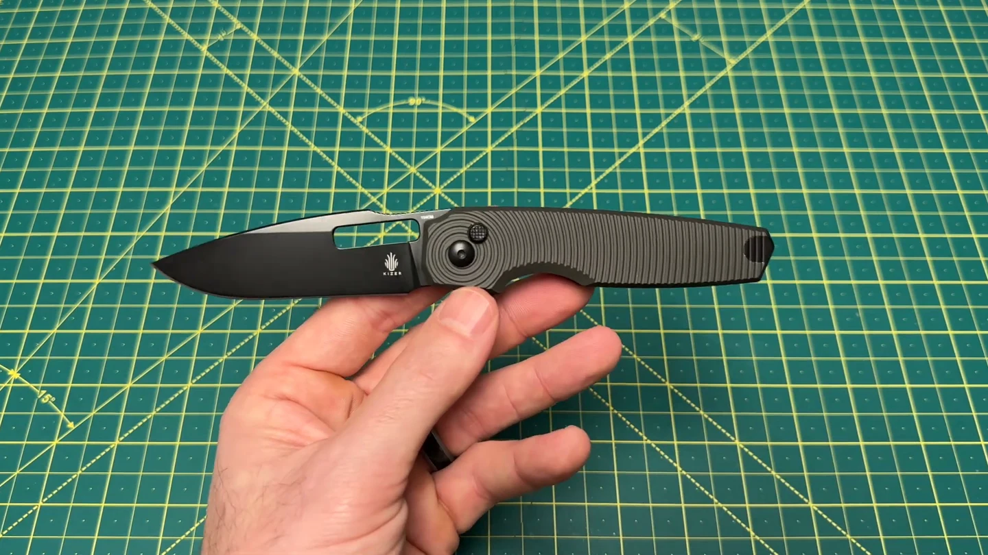 Reviewed Dogfish: gray aluminum, black 154CM blade and button lock
