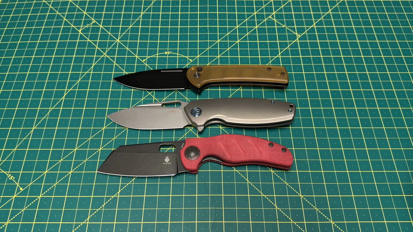 Top to bottom: CIVIVI Conspirator, titanium Tityus and Kizer Sheepdog
