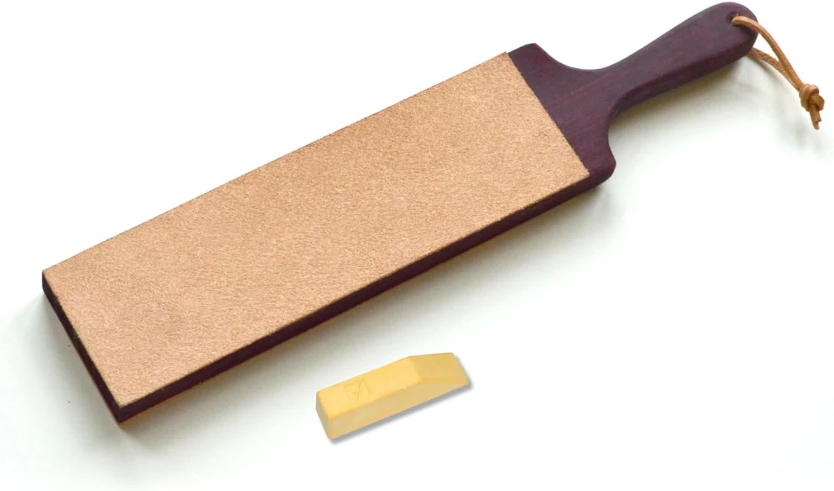 Flexcut PW16 dual-sided leather paddle strop and included gold compound
